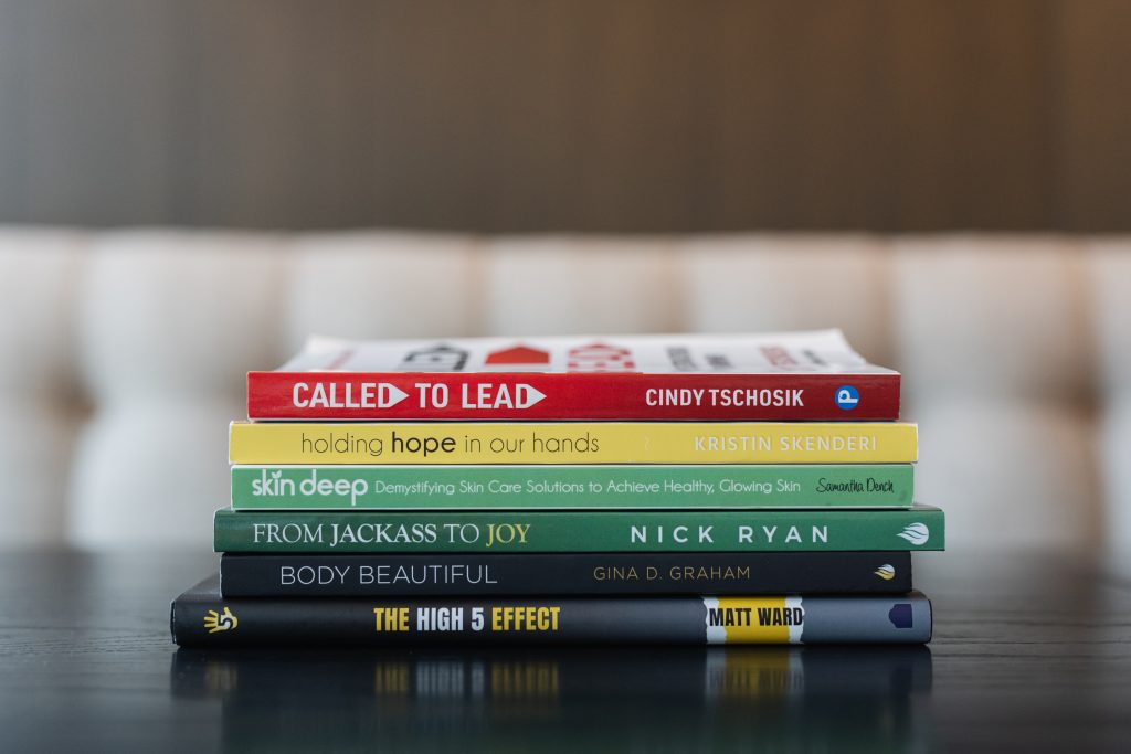 A stack of inspirational books